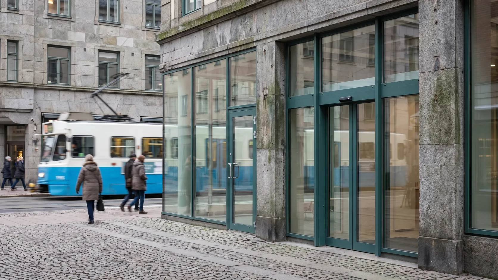 Entré till en mottagning på en gata i Göteborg med en spårvagn i bakgrunden.